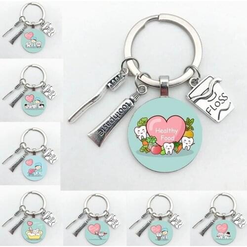 New Creative Cute Cartoon Teeth Pattern Dentist Medal Keychain Childrens Gift Glass Dome Pendant Keyring Hoilday Party Souvenir