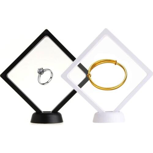 1 x Creative Suspended Acrylic Jewelry Display Holder Case With Base 11*11*2CM