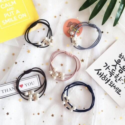 Simple temperamental pearl string ball with a string of multi-layer elastic rubber band with a rubber band