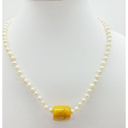 5MM 3A natural pearls. Coral necklace 18"