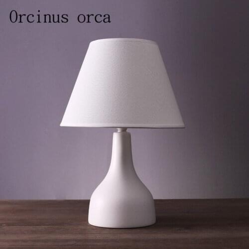 Nordic simple modern table lamp living room bedroom bedside creative American lovely warm ceramic table lamp Postage free