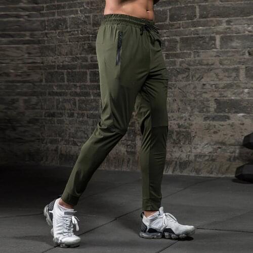 Fall 2021 Hot Men Running Tights Zipper Pocket Compression Sports Trousers Gym Fitness Leggings Basketball Exercise Clothing
