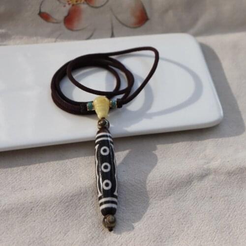 Natural five-eyed dzi necklace with raw ore, natural turquoise, natural amber tee, etc. Clear color material, special moist size