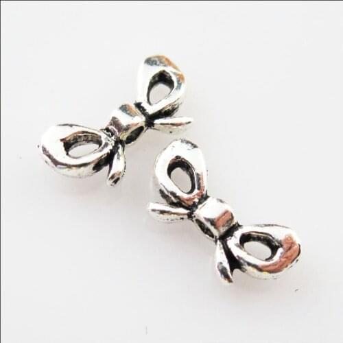 70Pcs Tibetan Silver Color Butterfly Knot Spacer Beads Charms 6x12mm