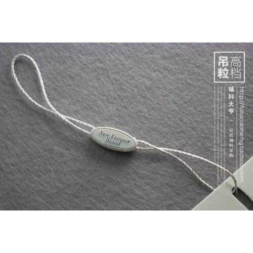 500PCS "NEW FAMOUS BRAND" clothes seal/ plastic seal tag/string lock /string buckle/string hang tag/STRING SEAL