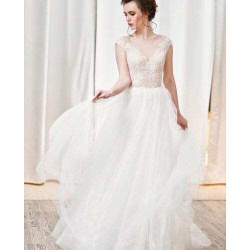 Wedding Dress A-Line Sheer Neck Cap Sleeve Lace Appliques Illusion Button Back Floor Length Sweep Train Elegant Bride Gown 2021