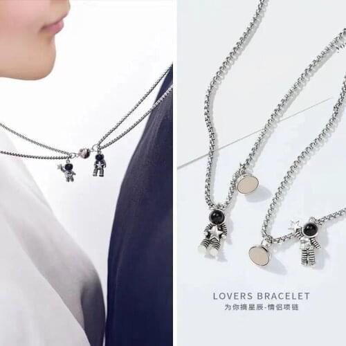 2Pcs Minimalist Lovers Matching Friendship Spaceman Astronaut Pendant Magnetic Distance Couple Necklace Jewelry Gift 2021