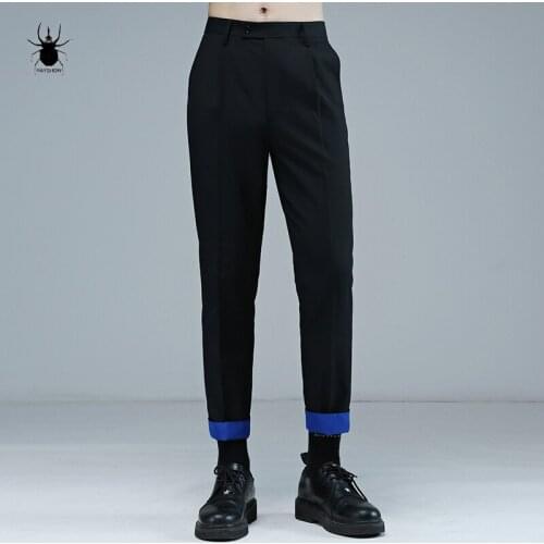British street style suit trousers with curly edges, tapered slacks, small legs