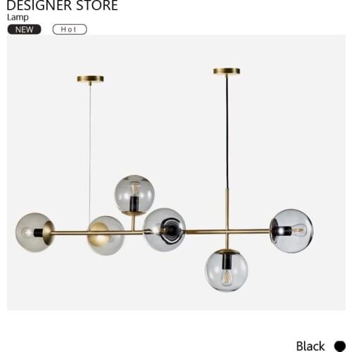 Light luxury designer long strip chandelier glass bulb metal pole chandelier suitable for dining room and living room model room