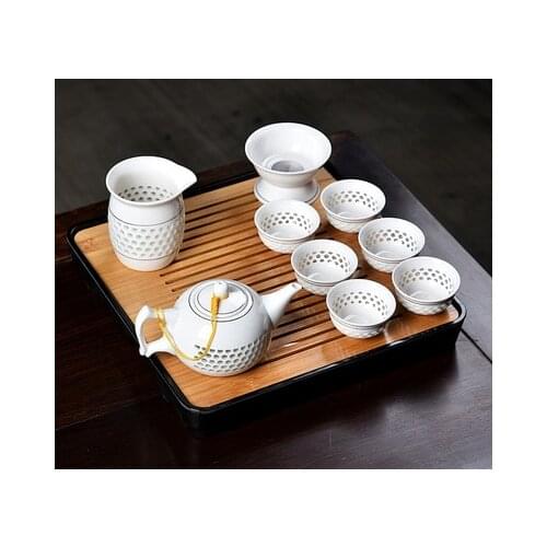 Hollow pattern Ceramic Kung-Fu Tea Sets Wholesale 10pcs Set Teapot-Melamine+Bamboo Tea Tray- Ceramic Tea Bowl Kit