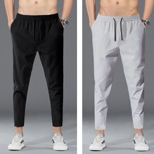 Mens nine-point pants summer loose casual pants nylon ice silk thin section air conditioning small feet sports pants
