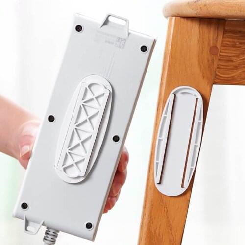 Hot 1 set Punch Free Plug Sticker Holder Wall Fixer Power Strip Holders Sockets Wall Holders Shelf Stand Holder Plug Hook