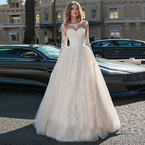 Attractive Lace Bateau Neckline Ball Gown Wedding Dresses Long Sleeves Champagne Crystals Bridal Dress vestidos de noivas