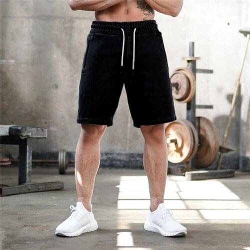 Man Sports Shorts 2020 Male Fitness Shorts Summer Solid Color Loose Casual Shorts with Pockets