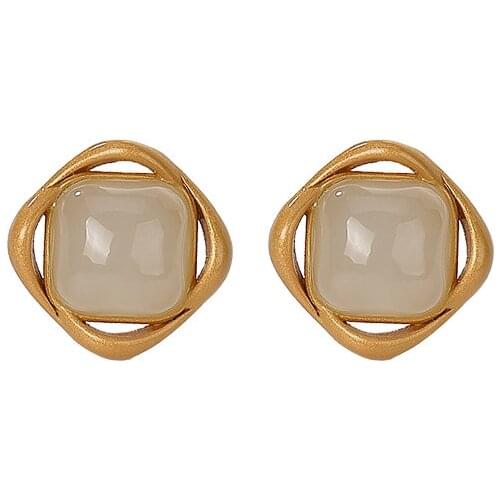 S925 sterling silver gold-plated natural Hetian jade ear studs refined personalized simple spiral geometric womens earrings