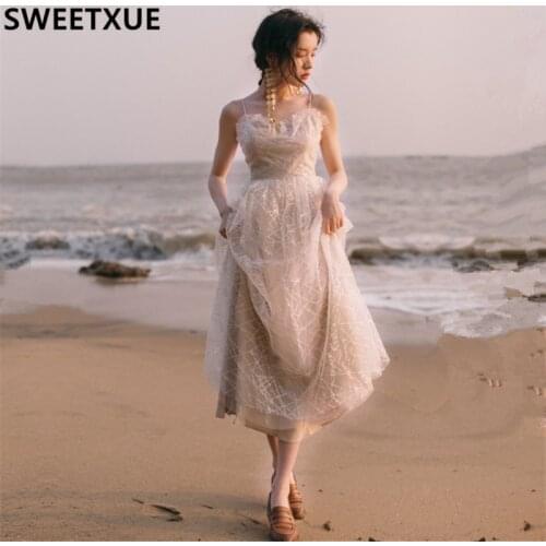 SWEETXUE Seaside Beach Dress Female Summer Fairy Spaghetti Strips French Mesh Patchwork Sequins Elegant Temperament Party Dress