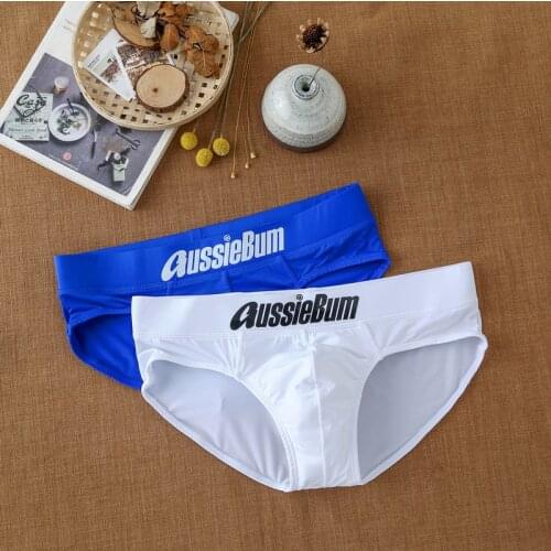 Mens triangle underwear with milk silk low waist elastic bag