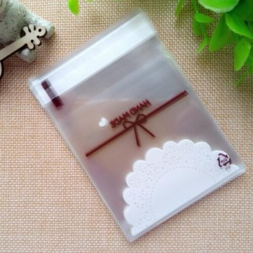 300pcs/lot-10*10cm Lovely lace bow Print Gifts Bags Cookie packaging self-adhesive plastic bags for biscuits Candy Cake package