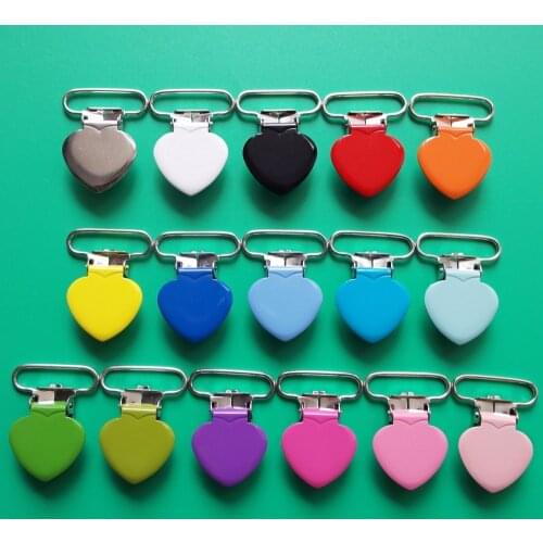 Sutoyuen 100pcs 25MM Heart Suspender Clips Metal Dummy Soother Bib Mitten Clips Baby Pacifier Clip Holder With Plastic Teeth