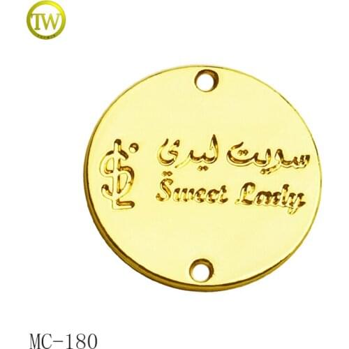Brand logo stamping custom die cast metal tag for swimwear