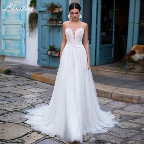 Lhuilier Elegant A-line Illusion Neck Tulle Wedding Dresses 2020 Sweep Train Beaded Lace Appliques Sleeveless Bridal Dress