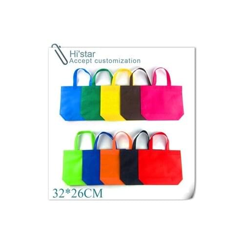 32*26cm 20pcs/lot Cusomized non woven shopping bags , various design ,silk screen printing . Eco-friendly material