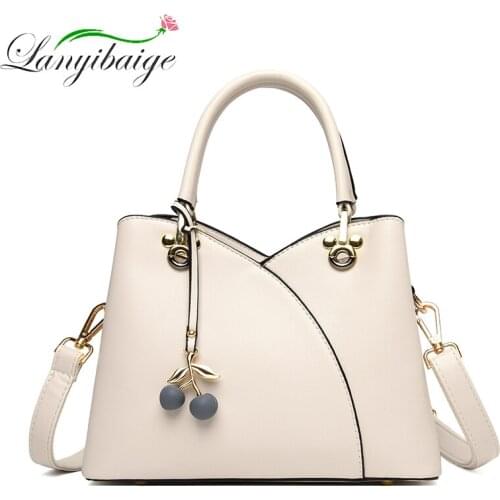 2021 Hot Sale PU Leather Messenger Bag Ladies Brand Stitching Designer Bag Large Capacity Handbag Exquisite Pendant Shoulder Bag