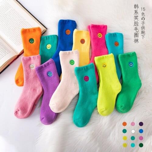 Three pairs of multicolor combination cute smiley embroidered childrens socks