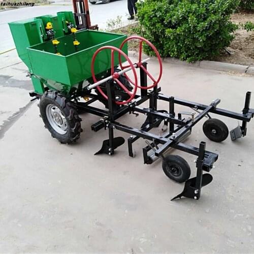 Two-row potato planter with four-wheel tractor for potatoes planting with laminating machine