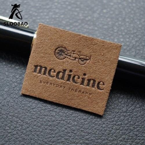 Custom embossed logo design jacket PU patch leather labels for clothing handbags hat beani