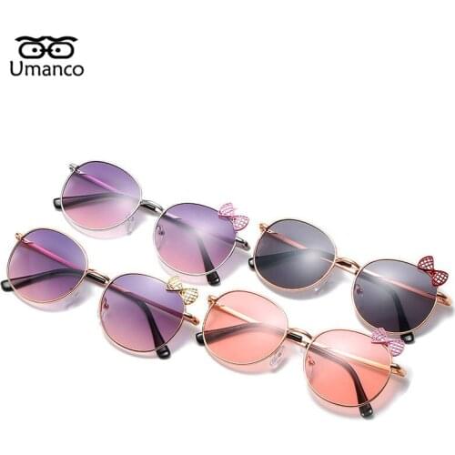Umanco 2021 New Bow-knot Decoration Oval Kids Sunglasses For Children Alloy Frame AC Lens Fashion Baby Beach Accessories Gifts