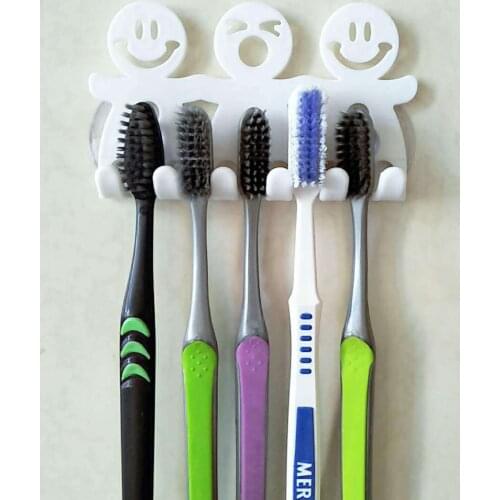 Cartoon sucker-type family of three toothbrush holder cute smiley toothbrush holder villain toothbrush holder/toothbrush holder