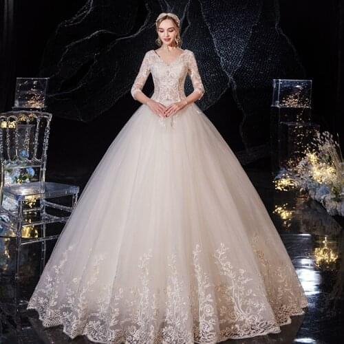 EZKUNTZA 2021 New Sexy V Illusion Neck Half Sleeve Wdding Dress Luxury Lace Embroidery Plus Size Lace Up Princess Ball Gown