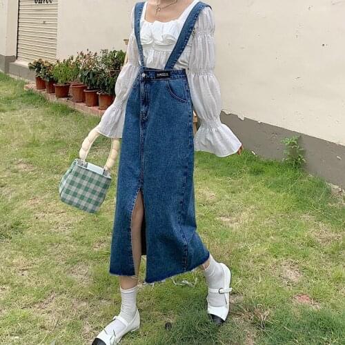 Chinese new female skirt pure color versatile high waist irregular slit in long jeans strap skirt spot