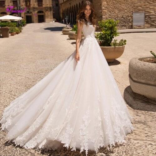 Fsuzwel Graceful Appliques Cap Sleeves A-Line Wedding Dresses 2020 Luxury Beaded Princess Bridal Gown Vestido de Noiva Plus Size