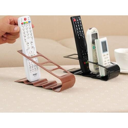 New 1PC TV DVD Step Practical Four Remote Control Frame Plastic Remote Control Bracket Mobile Phone Holder Stand Rack Up To 4