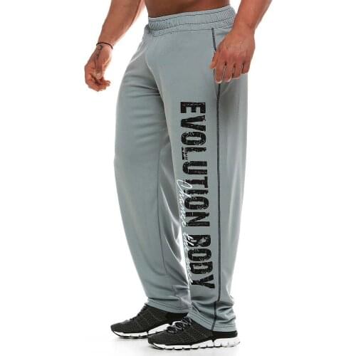 Muscle mens Sweatpants fitness training joggers casual Autumn cotton Sweatpants Fashion streetwear pants men Elastic waistband