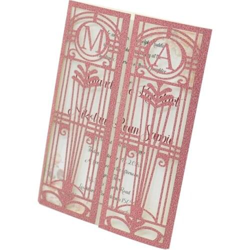 Blush pink glitter paper laser cut wedding invitations