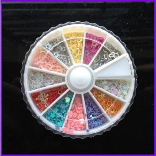 1X Wheel Nail Art Rhinestones Decoration 3D 12 Design Mix Color Diamond Round Star Nail Studs AA009