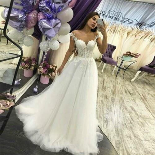 Sexy Sheer Scoop Neckline Cap Sleeves A Line Wedding Dresses 2021 Lace Bodice Ivory Applique Soft Tulle Floor Length Bridal Gown