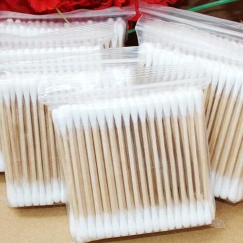 100Pcs Disposable Double Head Wood Stick Cotton Swab Buds Beauty Makeup Tool this product is a household must-have product is a