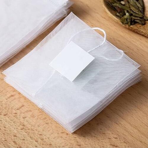 100Pcs/Lot New Nylon Tea Bags Filter Folded Empty Scented With White Tag for Herb Loose Tea