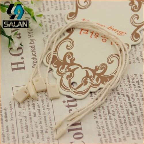 Factory direct sales beige clothing universal hanging tablets tag line without white plate double plastic plastic hanging tablet