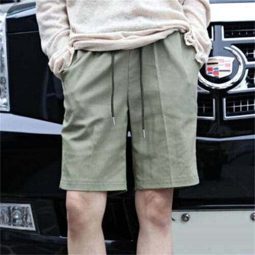 2021 Korean fashion mens new summer solid color lace up straight tube fashion cotton and hemp Shorts Large