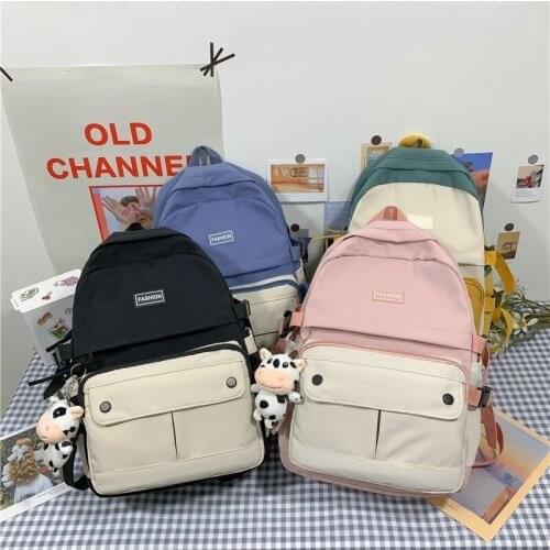 Fashion Womens Backpack Cute Doll Pendant Anti-theft Waterproof Schoolbag For Girls Summer New Backpack With Many Pockets 2021