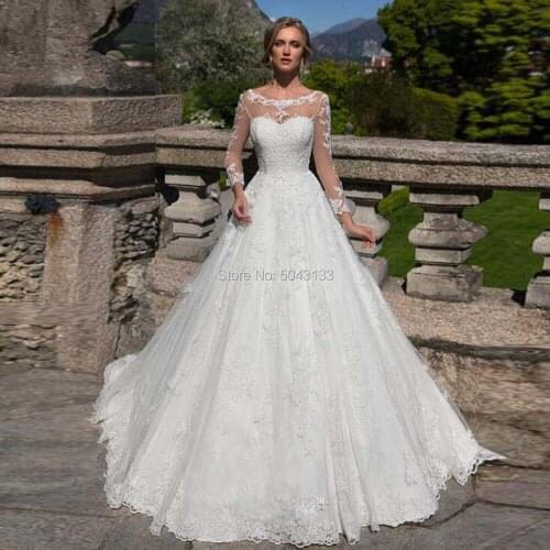 Ball Gown Long Sleeves Wedding Dresses with Lace Appliques 2020 Sexy Sheer Scoop Neckline Corset Back Floor Length Bridal Gowns
