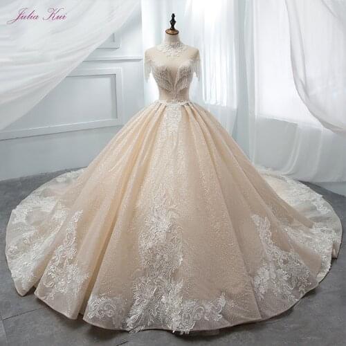 Julia Kui Vintage Shiny Embroidery And Tassel Beading Chapel Train High Neckline Ball Gown Wedding Dresses With Cap Sleeves