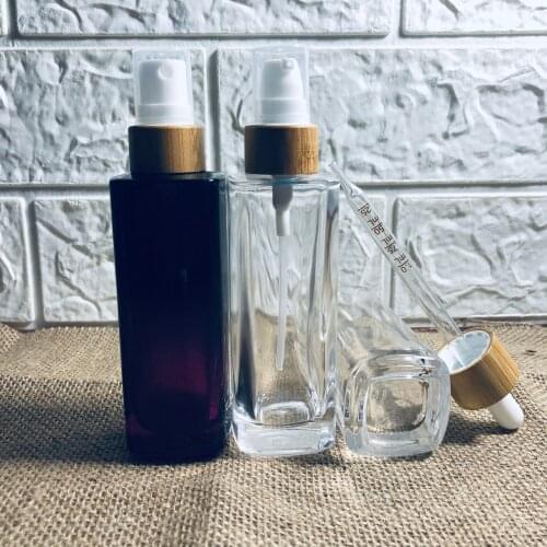 Custom Logo 75ml clear Square Dropper Bottle With Spray Lotion Pump Bamboo Lid Cap Glass Empty Container Essential Oil Bottles