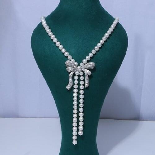 28-30“ Womens White Freshwater pearl bow Cz sweater chain necklace