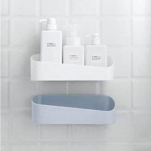The bathroom is strongly pasted to the wall-mounted plastic free punching wall storage rack geometric modeling bathroom rack